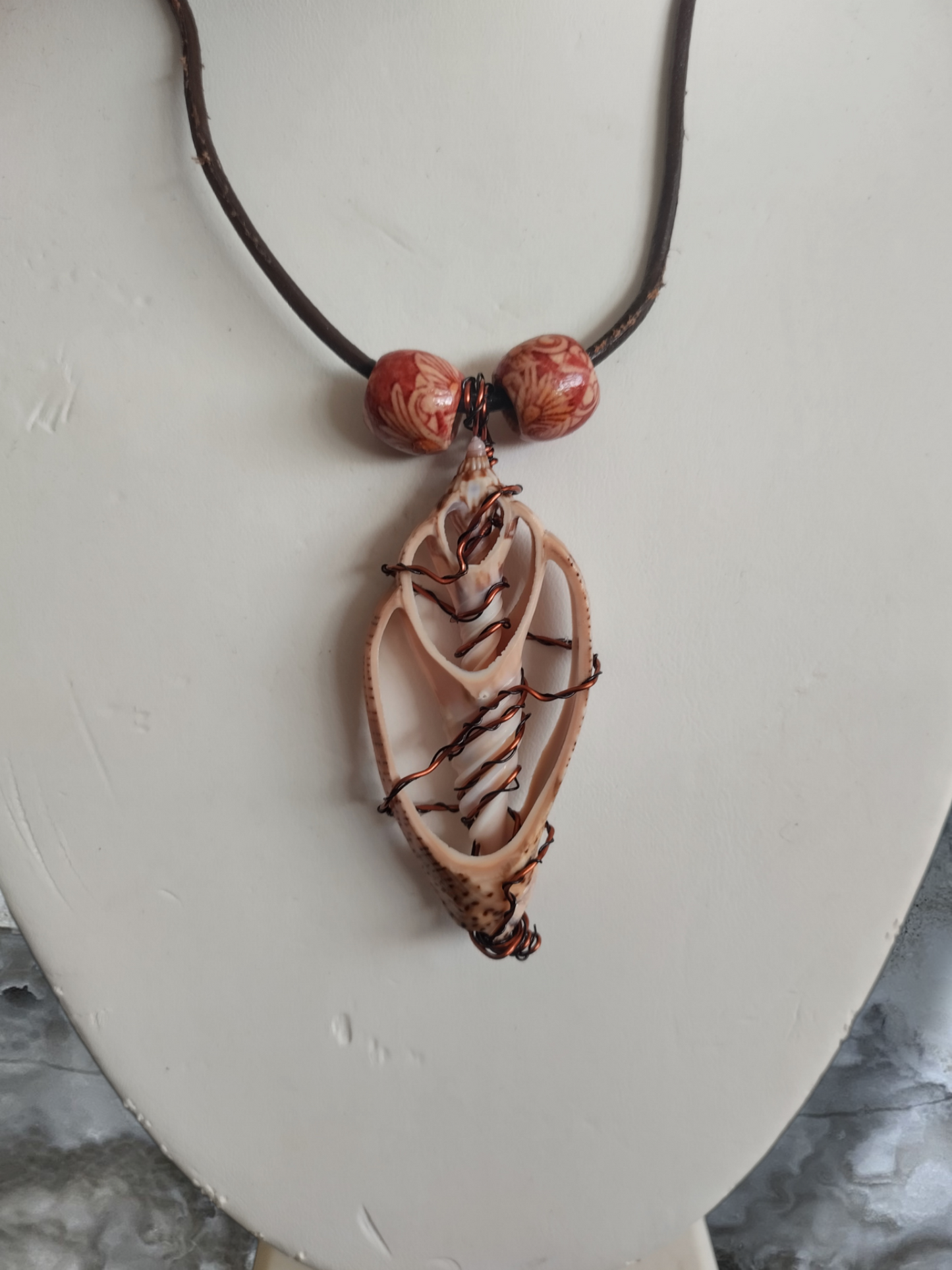 Shell pendant necklace.