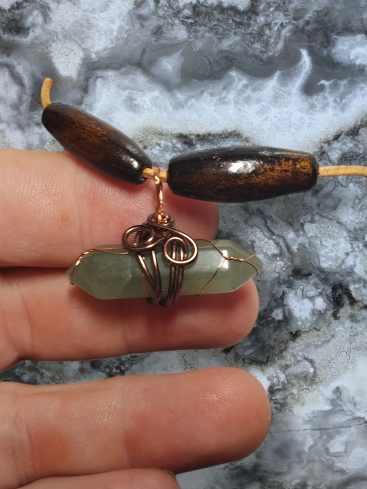 Hand wrapped pendant on an adjustable leather cord necklace