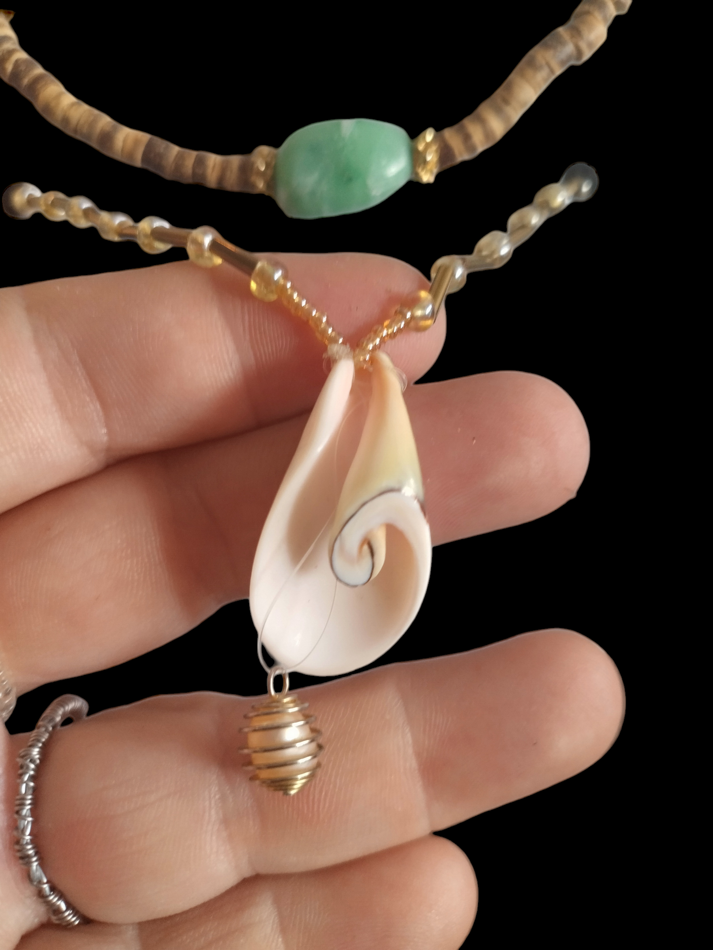 Shell with real pearl necklace and bracelet.