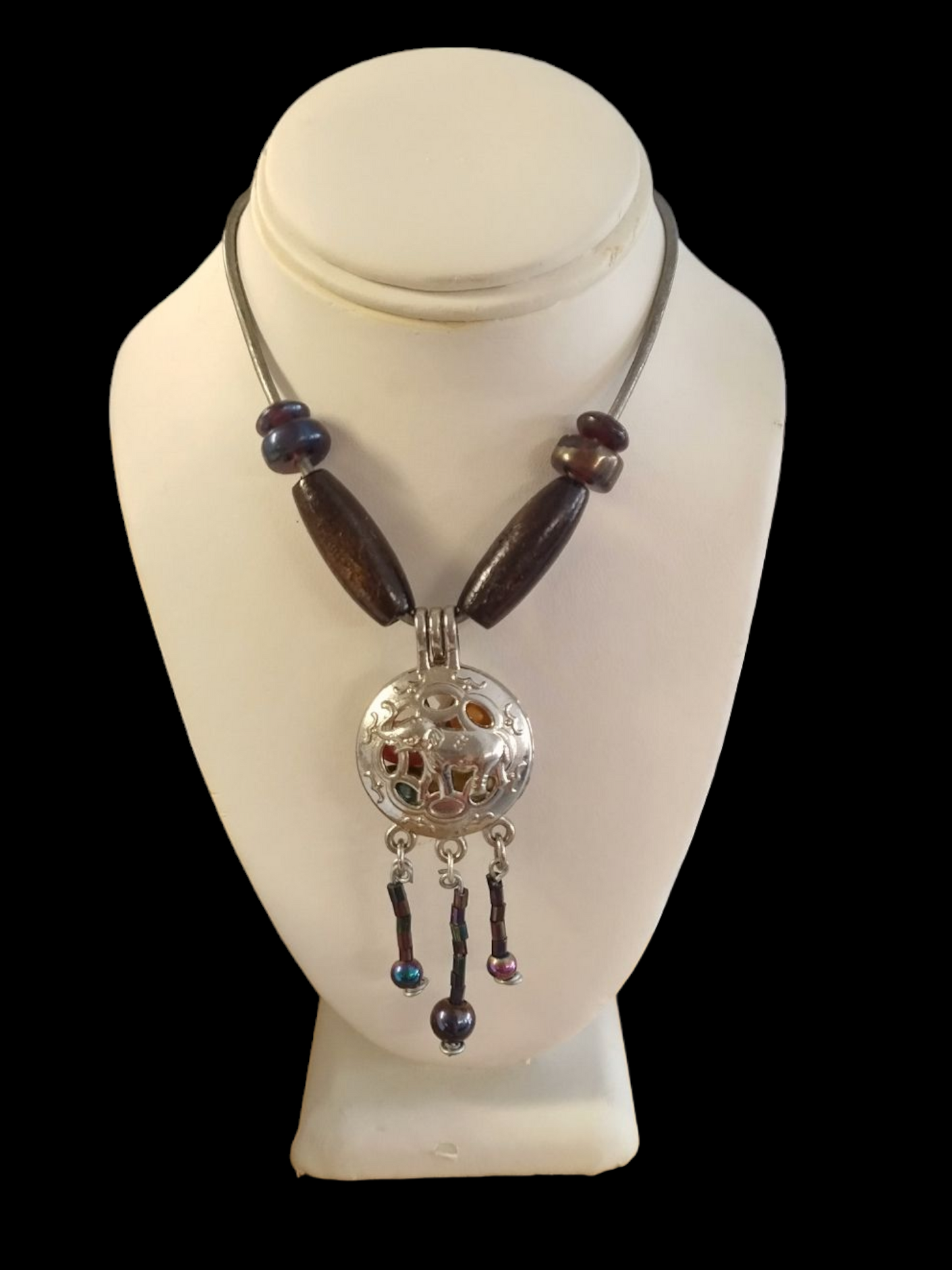 Pearl dreamcatcher cage elephant necklace.