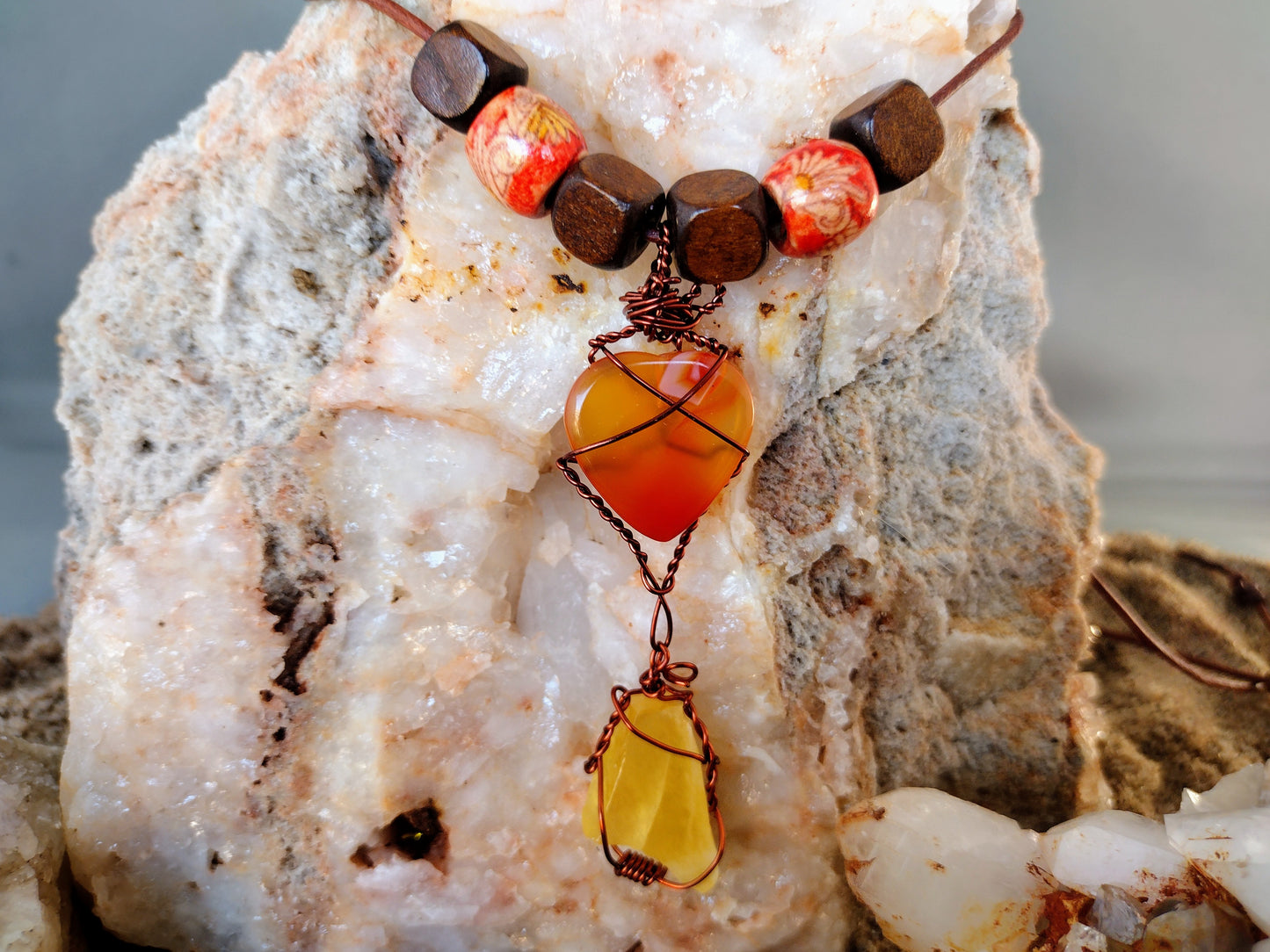 Necklace with hand wired carnelian heart pendant.